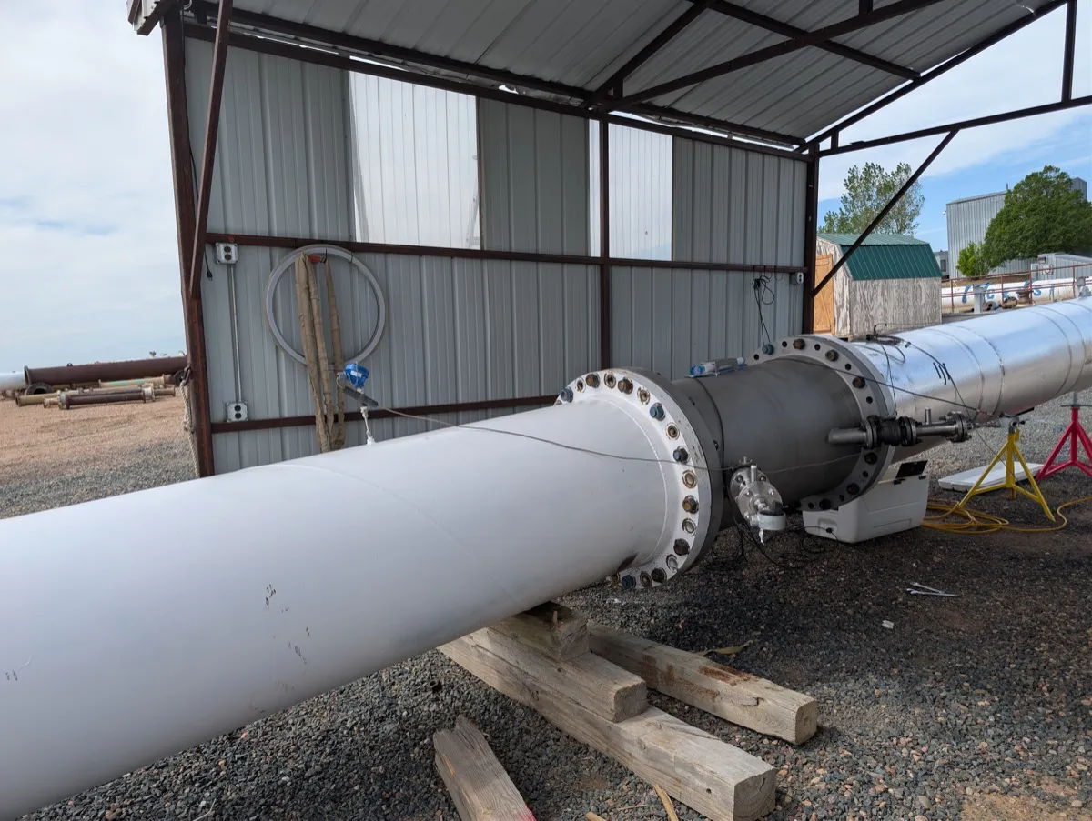 30-inch ultrasonic gas flow meter flow cell installed in the CEESI meter run under a shelter, transducers and cables connected