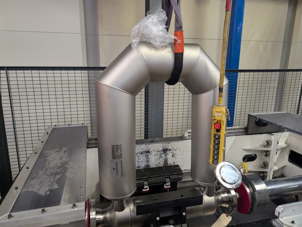 Coriolis mass flow meter mounted on test bench during Factory Acceptance Testing